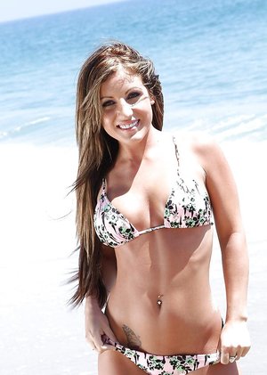 Young blonde girl Blue Angel shows her flexibility and vagina on nude beach